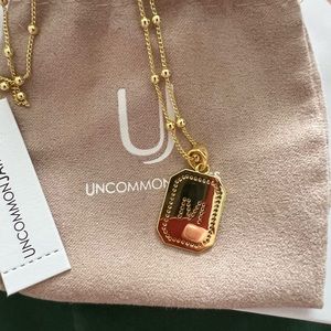 Uncommon James M initial necklace